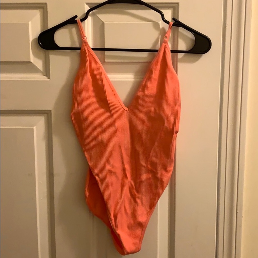 Hot pink low back bodysuit